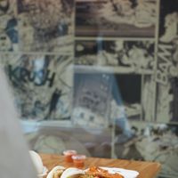 The Menu with 2 Bao Burgers and Sweet Potato Fries at BAO BAR 1070 in Vienna