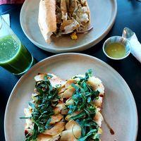 Torta de chilaquiles & Toast with ricotta, pear slices & spinach at VegCo Restaurante Vegano in Queretaro