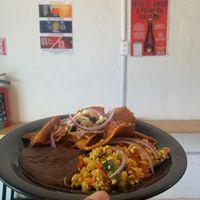Chilaquiles, scrambled tofu and beans. at VegCo Restaurante Vegano in Queretaro