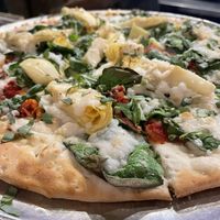 Vegan option of Pandoras Box. If you look closer you can actually see the melted crumbles of FETA 😳😭 at Extreme Pizza in Myrtle Beach