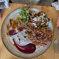 Cashew tart with aubergine salad and quinoa salad. at Goji Vegetarian Cafe and Deli in York