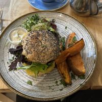 Mushroom and tofu burger with roasted sweet potato   at Goji Vegetarian Cafe and Deli in York
