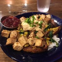 Nomad bowl with cranberry salsa. So f-ing good! Love this place. at Coyote Kitchen in Boone