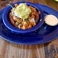 Tropical guac bowl special with blackened tempeh and vegan red aioli at Coyote Kitchen in Boone