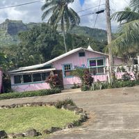 The outside from the parking lot, it’s set back off the main roadd  at Russell's by Eat Healthy Kauai in Wailua