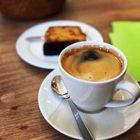 Long Black and a slice of ginger cake  at Serenity Bean in Moreton-in-marsh