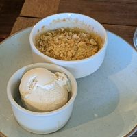 Apple and elderflower crumble (crumble filling changes regularly depending on what's in season) at The Jackdaw in Denton