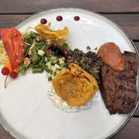 Seitan steak, onion badji and lots of different textures and flavors   at De Levensboom in Hasselt