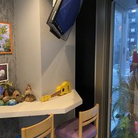 three places to sit  at Coconut Glen's in Tokyo