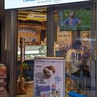 There are some seats in the corner at Coconut Glen's in Tokyo