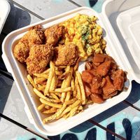 Large Mob Plate with Spicy Fried Chicken, Smackaroni, Mob Fries, and Sweet Candied Yams.   at Vegan Mob in Oakland