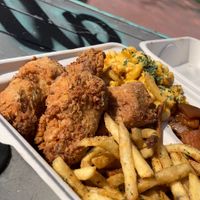 Large Mob Plate with Spicy Fried Chicken, Smackaroni, Mob Fries, and Sweet Candied Yams.   at Vegan Mob in Oakland