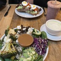 Avocado on toast, miso bowl with added tofu. Drinks were very berry smoothie and matcha latte    at Oliver Green - East in Amsterdam