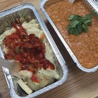 ‘Dirty pot’ mac and cheese loaded potatoes 
And coconut dhaal  at Temperance in Halifax