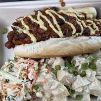 Chili cheese dog with potato salad at Veggie Grill by Next Level in Burbank