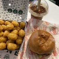 Vegan chicken burger and tater tots   at Neat Burger - Oxford Circus in London