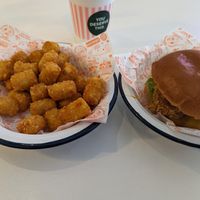 Seasoned tater tots, vanilla shake, smokehouse burger, all vegan. at Neat Burger - Oxford Circus in London