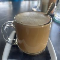 Fresh brewed coffee with steamed oat milk  at Lola Taqueria in Palm Beach