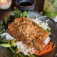 Salad with noodles and spring rolls  at Soy in Munich