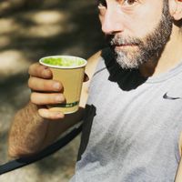 Hubby with green drink at Rail Trail Cafe in New Paltz