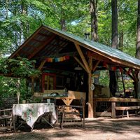 Pizza oven and vendor selling t-shirts and vintage items  at Rail Trail Cafe in New Paltz