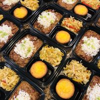 Red Beans, Vegan Sausage over Rice, Jamaican Steamed Cabbage and Corn Pudding Muffins  at Abbie's Plant Based Cuisine in Katy