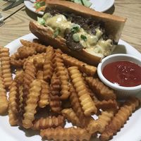 Philly cheeze steak and fries. at Loving Cafe in Fort Wayne