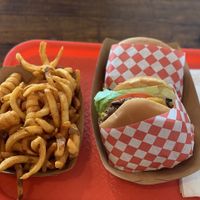 Cheeseburger and curly fries at VOWburger in Los Angeles