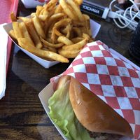 Burger and curly fries  at VOWburger in Los Angeles
