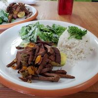 Daily special: cilantro rice with stuffed avocado with vegan meat and vegan cesar salad.  at Family Health Food in San Juan