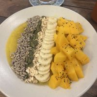 Tropical yellow smoothie bowl   at Sacred Lotus Cafe in Phnom Penh