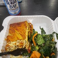My unusual but delicious lasagna, collard green salad and berry kombucca at NuVegan in Washington