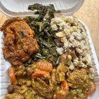 Curry chicken with sides  at NuVegan in Washington