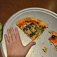 I have kinda big hands, personal pizza was a good size for me at Ramunto's Brick n'Brew in Hanover