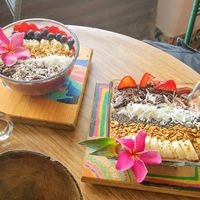 Two Acai Bowls at a nearby table. at Tropical Kitchen Cabo in Cabo San Lucas