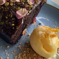 Bizcocho de chocolate con toque de maracuyá y sorbete  at Xiringuito Escribà in Barcelona
