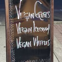 Vegan waffles with vegan ice cream on top! at Cream & Crepes Cafe in Richardson