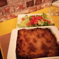 Huge portion of homemade lasagna at La Bouche'rit in Grenoble