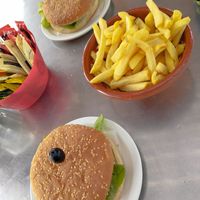 Chips to share and 1 soya burger and 1 carrot and seaweed burger. at Barril Beach Cafe in Faro