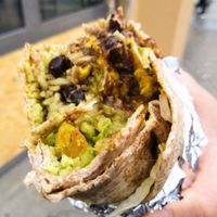 wholegrain burrito with cilantro rice, marinated soy meat and avocado at Dolores in Berlin