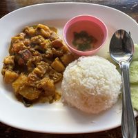 Yellow curry with white rice, 55 baht  at CMU Vegan - Kinphak Cafe in Chiang Mai