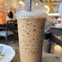 Coconut milk w/ coffee, ice (40 THB)  at CMU Vegan - Kinphak Cafe in Chiang Mai