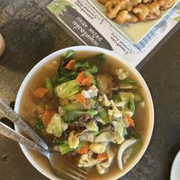 Flat noodles with gravy (better without) and fried cauliflower   at CMU Vegan - Kinphak Cafe in Chiang Mai
