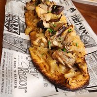 Coca vegan, cebolla y hongos. at Bar España in Mallorca