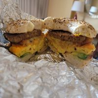 Vegan egg and cheese bagel with Beyond sausage, hashbrowns, and avocado at Roland Park Bagels in Baltimore