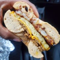 Vegan Just Egg and Cheese, Sun dried tomatoe bagel, vegan cheddar, hash brown, vegan tempeh bacon with vegan mayo at Roland Park Bagels in Baltimore