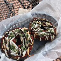 Fabulous pizza bagel enjoyed on the patio at Roland Park Bagels in Baltimore