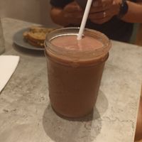 Yoga smoothie: pinneappe, strawberry, banana, wheatgrass, coconut or almond milk at Organica - Town Center in Panama City