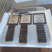 Specialty Chocolates w the harvesters name and planation  location at Caribeans Coffee and Chocolate Factory in Puerto Viejo De Talamanca