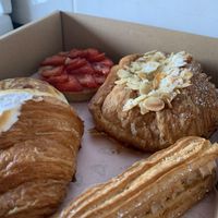 Lemon meringue croissant, strawberry tart, almond croissant and hazelnut eclair   at Oh My Days in Glebe